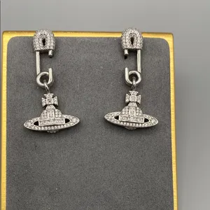 Vivienne Westwood Silver Tone Safety Pin Earrings w Drop Orb. Crystal encrusted thumbnail 2