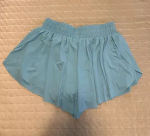 Blue pleated butterfly shorts with built-in spandex thumbnail 2