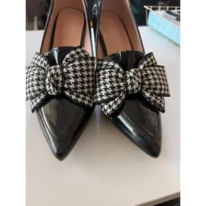 Source Unknown black patent pointed-heels with prominent black-and-white houndstooth bows thumbnail 2