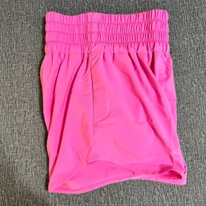 Nike Women’s Dri-Fit Ultra High Waist Shorts thumbnail 7