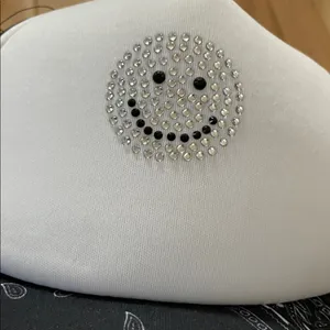 Black and White Trucker Hat with Rhinestone Design thumbnail 3