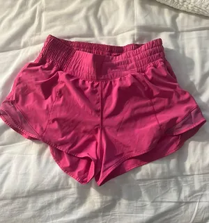 Size 4 Lululemon hotty hot shorts 2.5” pink thumbnail 1