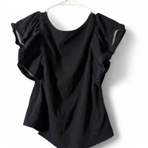 Anthropologie Maeve black top with puffy sleeves thumbnail 3