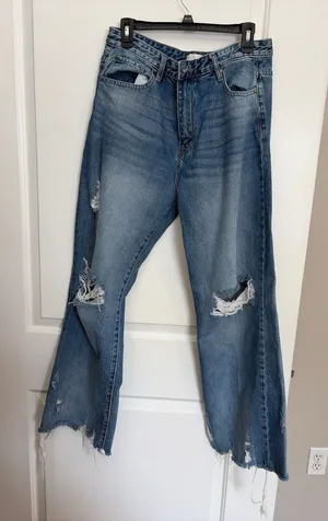 Petra 153 jeans w/ heavy knee destruction, whiskering, and a raw frayed hemline thumbnail 1