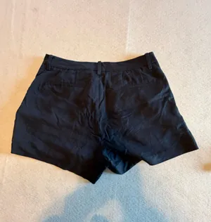 UNIQLO Women's Pleated Rayon Blend Dress Shorts in Black thumbnail 2