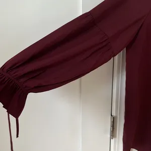 Burgundy long sleeve blouse in size M from Ann Taylor thumbnail 3