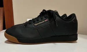 Reebok Women’s Black & Gold Princess Shoes thumbnail 1