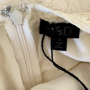 NWT NBD‎ Only Yours Asymmetrical Lace Dress in Ivory thumbnail 10
