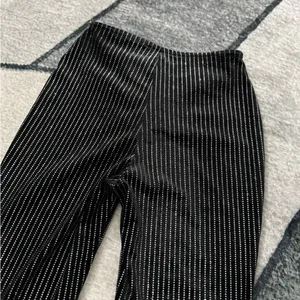 Urban Outfitters Black and White Patterned Flare Pants S/M thumbnail 8