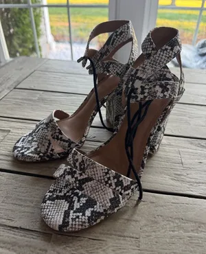 Gianni Bini snakeskin sandals featuring a block heel and ankle strap thumbnail 1