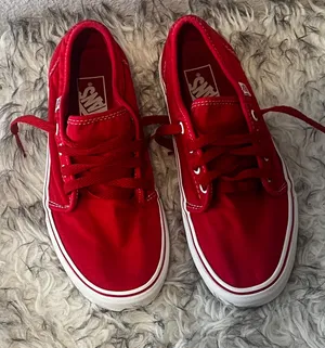 Red Vans Sneakers – Women’s Size 7 (Fits 8) Classic low-top red Vans with white stitching and sole. Barely worn, excellent condition. Labeled as US Women’s 7, but they fit more like an 8. Perfect for everyday style or streetwear looks. thumbnail 1