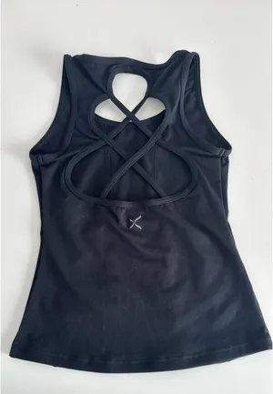 Capezio black tank top with cut out design on back. Size large child thumbnail 3