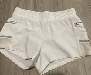 Fabletics White Women's Running Shorts with Reflective Trim thumbnail 1