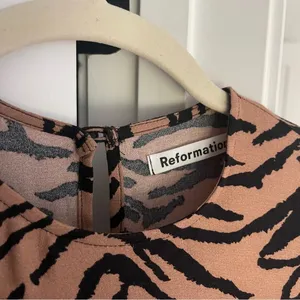 Reformation Brown Creed Button open Back‎ Long Sleeve Slit Dress tiger print thumbnail 2