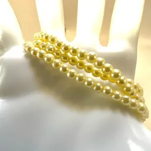 Triple strand faux pearl bracelet thumbnail 5