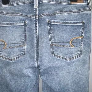 American Eagle Next Level Stretch Crop Jegging Distressed Ripped Blue Jeans 10 thumbnail 9