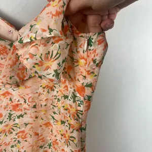 ASTR the Label Pemberly Dress in Peach Orange Floral high low size medium thumbnail 9