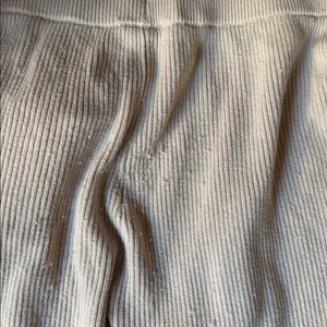 ALO Yoga Ribbed Lounge Pants in Soft Beige thumbnail 4