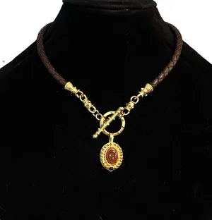 Brown leather braid toggle necklace with carved Roman head pendant thumbnail 1