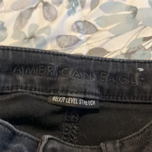 America Eagle Next Level Stretch Black Distressed Jeans Size 2 thumbnail 11