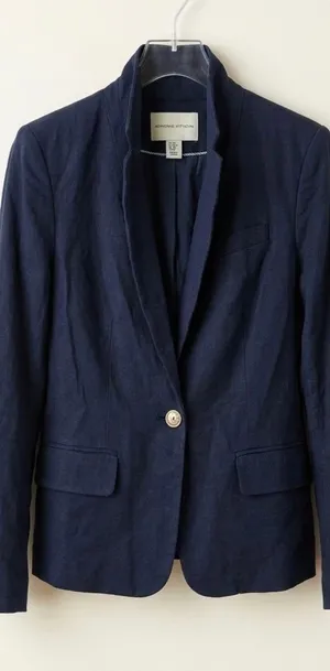 Adrienne Vittadini Modern Navy Linen-Blend Blazer - XS Elevate your wardrobe with this sophisticated Adrienne Vittadini blazer. Featuring a sleek, modern silhouette in a classic navy blue, this piece is the perfect blend of professional polish and effortless style.• Brand: Adrienne Vittadini (Modern Collection)• Size: Women's XS• Color: Deep Navy Blue• Condition: Like new, excellent pre-owned condition with no visible flaws.• Features: Elegant stand-up collar, single gold-tone button closure, and functional flap pockets. Finished with stylish button detailing on the cuffs.• Versatility: A true closet staple that transitions perfectly from a day at the office to a casual weekend look paired with jeans. The lightweight fabric and tailored fit offer a flattering, high-end feel. This blazer is ready to ship and elevate your next outfit!• Standard XS fit• Dry clean recommended to maintain the structured look. thumbnail 1