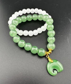 Set of Two Green and White Beaded Bracelets with Green Charm thumbnail 1