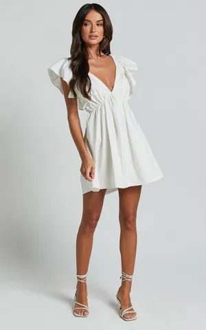 Showpo Raiza Mini Dress Ruffle Sleeve Tie Back Plunge Dress 100% Cotton In Off White! thumbnail 2