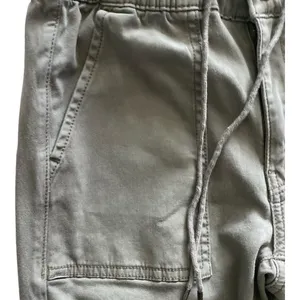 American Eagle -ARMY GREEN JOGGER PANTS-SIZE 2 Elastic waist with drawstring, zip front, two front and two back pockets, elastic ankles with a side zipper, excellent condition Measurements: Waist: side to side 13-16 inches Rise: 9 inches Inseam: 37 inches thumbnail 7