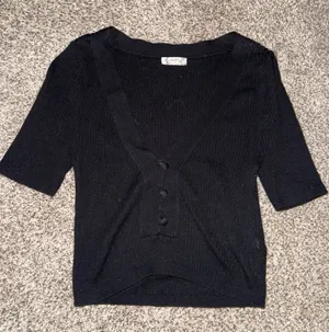 Intimately Free People Black Ribbed V-Neck Button-Front Short Sleeve Top thumbnail 1