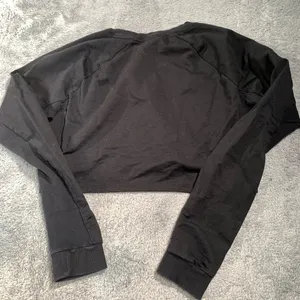 Gymshark black cropped long sleeve top XL thumbnail 11