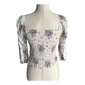 REWIND-CREAM COLOR FLORAL SMOCKED TOP-WOMENS SIZE SMALL Gorgeous top, fro t and back smocking, women’s size small, excellent condition Measurements: Bust: armpit to armpit 14-18 inches Length: shoulder seam to bottom 17 inches thumbnail 6
