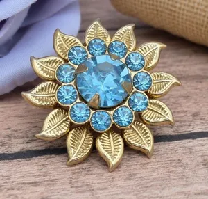 Vintage Blue Rhinestone Flower Brooch Gold Tone Leaf Floral Pin Unsigned 1.25” thumbnail 1
