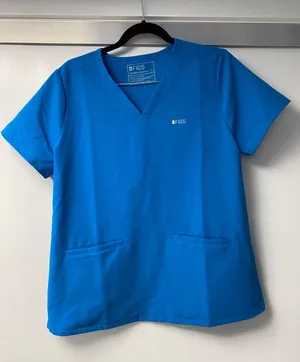 FIGS Women's Extreme Blue Casma™ - Three Pocket Extremes Scrub Top thumbnail 1