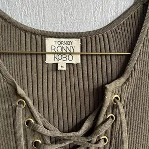 Torn by Ronny Kobo Lace Up Ribbed Knit Mini Dress‎ in Olive Green Size M thumbnail 5