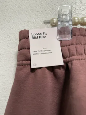 Pink Nike sweatpants with black logo thumbnail 4
