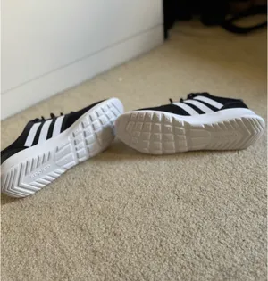 Nike Cloudfoam Women’s Adidas Pure Black Low-Top Running Sneakers 7 thumbnail 5