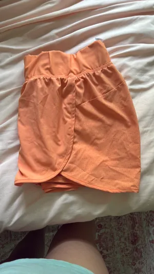 ASICS Women’s Athletic Shorts running orange medium thumbnail 2
