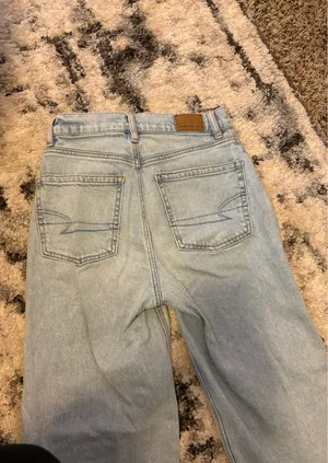 American Eagle Asymmetrical jeans thumbnail 4