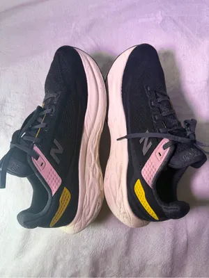 New Balance Women's Black Running Shoe with Pink & Yellow Accents thumbnail 9