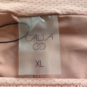 Calia Women's 14" Side Pleat Court Skort in Guava Pink Size XL NWT thumbnail 4