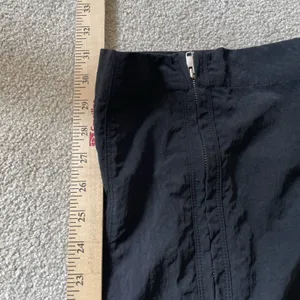 Nike Women's City Utility Zip Cuff Track Pants Athletic Black Green Size Medium thumbnail 14