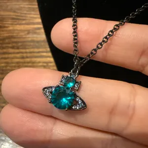Turquoise Blue Pendant Gunmetal Chain Necklace thumbnail 5