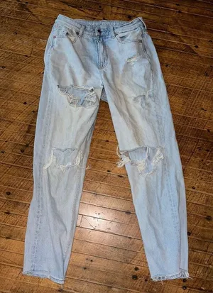 American Eagle destroyed distressed light wash mom jeans thumbnail 1