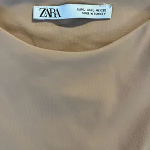 Beige Zara bodysuit. Small‎ snag on left. Size L thumbnail 2