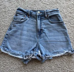 American Eagle High-Rise Light Blue Stretch Denim Frayed Hem Women's Shorts thumbnail 1