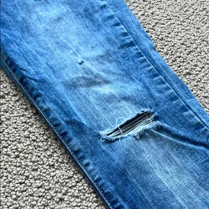 Denizen from Levi's Distressed Blue Low Rise Jeans thumbnail 6