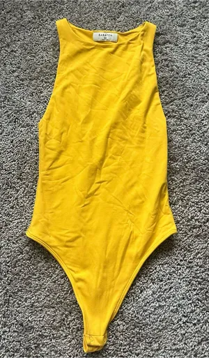 Aritzia Babaton Sleeveless Yellow Bodysuit thumbnail 1