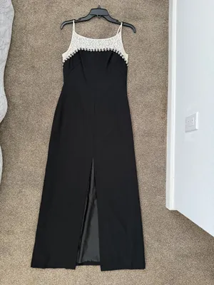Elegant black maxi dress featuring a delicate cream lace yoke and thin straps. thumbnail 8