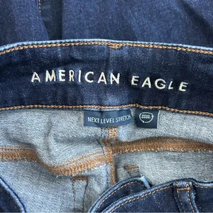 American Eagle Mid Rise Next Level Stretch Double Button Dark Wash Denim Flare 2 thumbnail 6