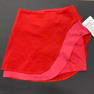 lululemon Tennis Skirt Size 2 Red Pink Asymmetrical Layered High Rise Skirt NWT thumbnail 1